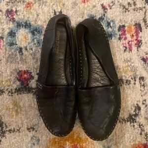 Black leather slides